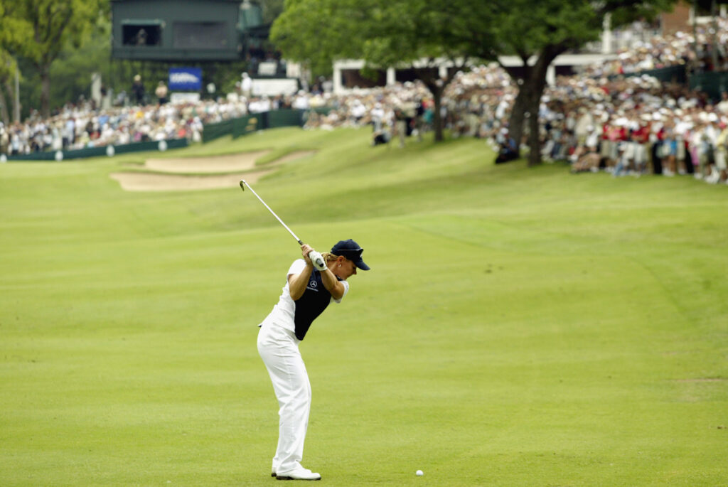 Annika Sorenstam hits her approach on the 18th fairway during the first round of the 2003 Bank of America Colonial
