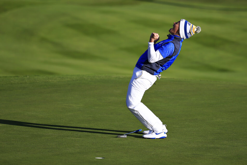 Suzann Pettersen celebrates holing the putt to win the 2019 Solheim Cup